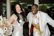Newlyweds smiling happily on their wedding day!