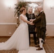 Real Bride in Nature-Inspired Tulle Wedding Dress with Plunging V-Neckline Called Jenessa by Rebecca Ingram