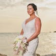 Bride wearing Franklynn by Sottero and Midgley at the beach