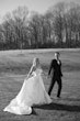 Bride wearing Selena by Maggie Sottero with her husband