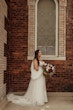 Bride in Dreamy Beaded Floral Lace A-Line Wedding Dress Called Laramie by Sottero & Midgley