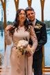 Bride Wearing Simple Long Sleeve Wedding Dress Called Bethany By Rebecca Ingram With Groom