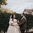 Bride Wearing Floral Jacquard Princess Wedding Gown Called Cyprus By Sottero And Midgley Looking At Groom