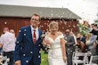 Bride wearing Josie by Rebecca Ingram with her husband getting hit with popcorn