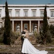 Groom With Bride Wearing Mikado A-Line Wedding Dress Raven By Maggie Sottero