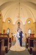 Groom With Bride Wearing White Lace Wedding Dress