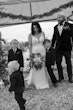 Bride wearing Luella wedding dress by Sottero and Midgley with her family