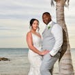Bride wearing Franklynn by Sottero and Midgley with her husband on the beach