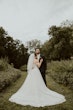 Bride In Strapless Sequin Artemis Maggie Sottero With Groom