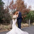 Bride Wearing Lace Crepe Bridal Dress Called Bracken By Sottero And Midgley Kissing Groom