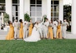 Bride wearing Lettie by Rebecca Ingram with her wedding party