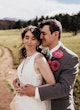 Bride Wearing Sexy Lace Wedding Dress Called Hazel By Rebecca Ingram And Groom Holding Each Other