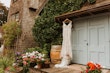 Greenley wedding dress by Maggie Sottero hanging up outside