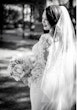 Real Bride In A White Long Sleeve Wedding Dress Named Nikki By Maggie Sottero With Veil And Flowers