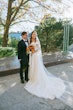 Bride Wearing Satin Aline Wedding Dress Called Ekaterina By Maggie Sottero With Groom