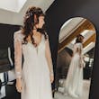 Bride wearing Chantal Lynette wedding dress by Maggie Sottero looking in the mirror