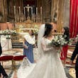 Bride Wearing Glam Long Sleeve Wedding Dress Called Seneca By Sottero And Midgley Holding Her Bouquet