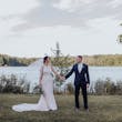 Bride with groom wearing budget friendly fit and flare wedding dress