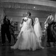 Bride dancing in wedding dress called Veda.