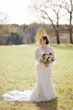 Bride in Geometric Allover Lace Wedding Dress with Sweetheart Neckline Called Dover by Maggie Sottero