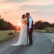 Groom With Bride Wearing Ivory Satin Sheath Wedding Dress Ettia By Maggie Sottero