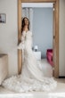 Bride wearing Ryker wedding dress by Sottero and Midgley