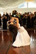 Bride wearing Mitchell Marie by Maggie Sottero kissing her husband