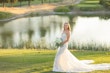 Bride Wearing Lace Fit-n-flare Wedding Dress Called Nyjah By Sottero And Midgley In Front Of A Pond