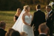 Bride Wearing Lace Mermaid Wedding Gown Called Toccara By Maggie Sottero With Groom At The Outdoor Ceremony