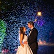 Bride Wearing Simple Ballgown Wedding Dress Called Fortune By Maggie Sottero With Shining Lights Behind Them