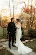 Bride Wearing Pearl Sparkly Wedding Dress Called Drew By Maggie Sottero With Groom In A Garden