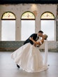 Bride wearing Zinaida by Maggie Sottero kissing her husband