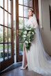 Bride wearing Lorraine Dawn wedding dress by Rebecca Ingram