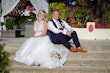 Groom With Bride Wearing High Neck Princess Wedding Dress Ardelle By Rebecca Ingram