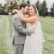 Groom With Bride Wearing Boho-Chic A-line Wedding Dress Courtney By Rebecca Ingram
