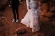 Groom With Bride Wearing A White A Line Wedding Dress Named Keisha By Maggie Sottero