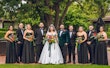 Bride wearing Anniston Marie by Maggie Sottero with the wedding party