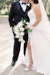 Bride wearing Nisha by Maggie Sottero with her husband