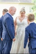 bride in lace and tulle wedding dress called meryl by maggie sottero