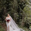 Bride On Beach With Groom In Strapless Wedding Dress Called Monaco By Maggie Sottero