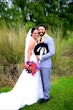 Bride In Floral A-line Laramie Sottero Midgley With Groom