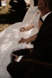 Groom With Bride Wearing Ball Gown With Shimmery Lace Motifs Valona By Sottero And Midgley