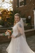 Bride Wearing Asymmetrical Wedding Gown Winona By Rebecca Ingram