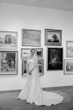 Bride wearing Mitchell Marie Vida by Maggie Sottero in a museum