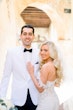 Bride In Crepe And Lace Wedding Dress Called Beverly By Rebecca Ingram With Groom