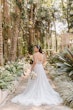 Real Bride in Floral Lace Boho A-Line Wedding Dress with Deep Illusion V-Neckline Called Lorenza by Maggie Sottero 