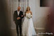 Bride Wearing Aline Satin Wedding Gown Called Scarlet By Maggie Sottero Walking With Dad Down The Aisle