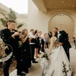 Bride wearing Tristyn wedding dress by Maggie Sottero kissing her husband