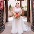 Bride Wearing A-line Tulle Wedding Dress Ardelle By Rebecca Ingram