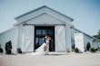 Groom With Bride Wearing Strapless Floral Princess Wedding Dress Orlanda By Maggie Sottero